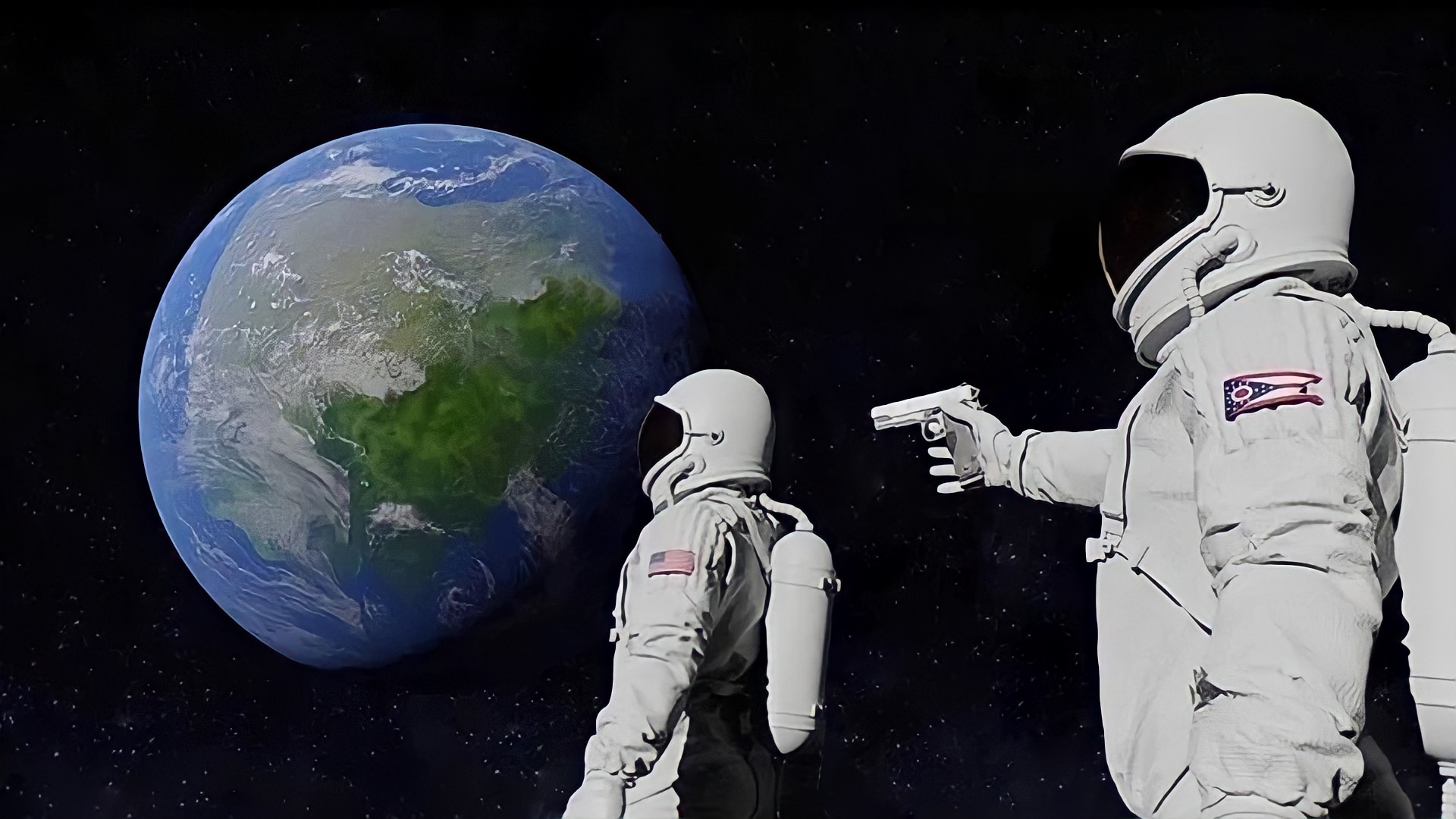 Two astronauts in space, one pointing a gun at the other, with Earth in the background.