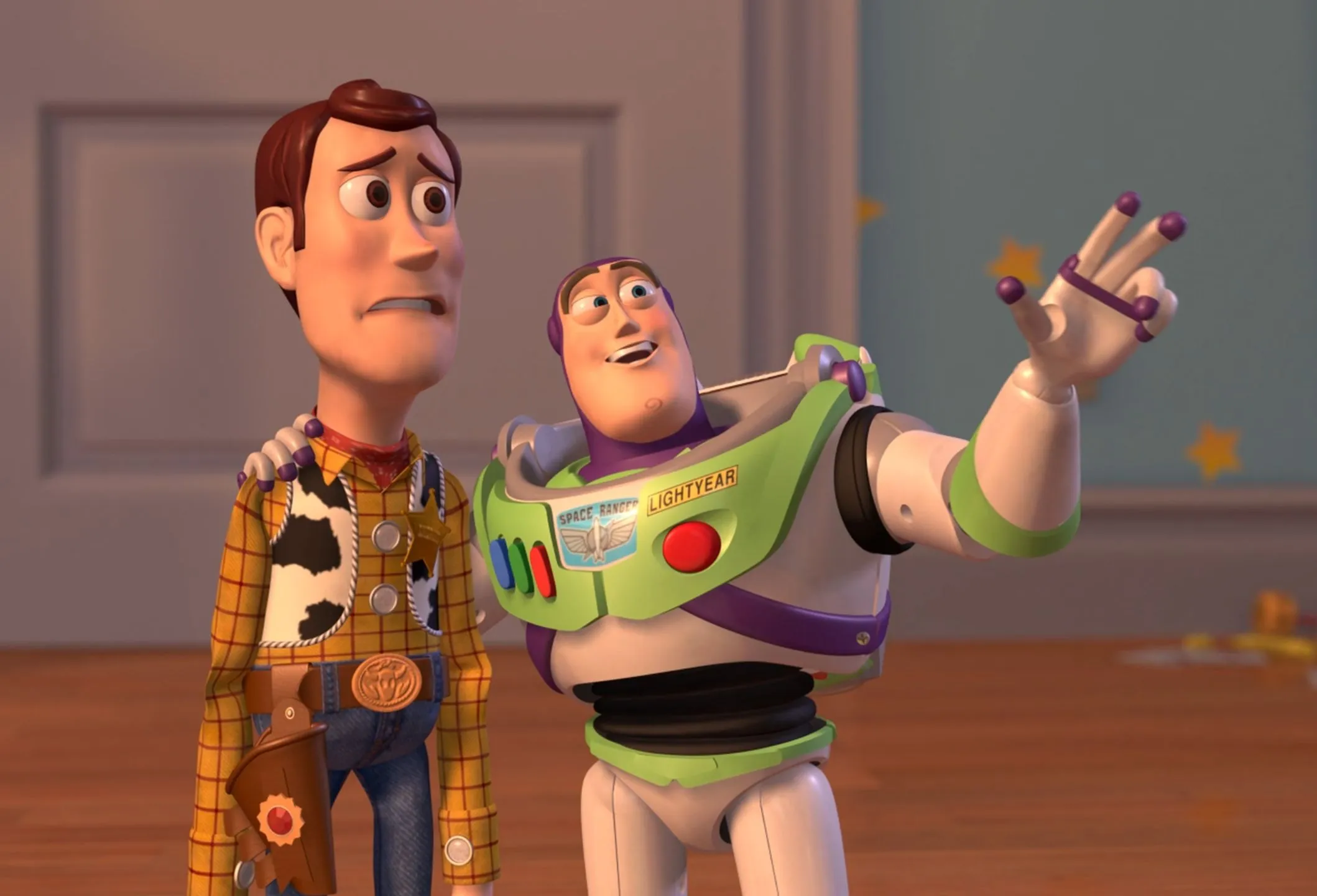 Buzz Lightyear gesturing with Woody looking concerned in a room with stars on the wall.