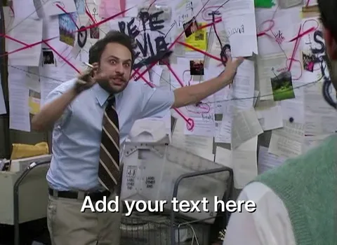 Charlie from It's always Sunny in Philadelphia in the office pointing at a chaotic wall of papers and red strings.
