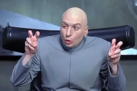 Dr. Evil, from the Austin Powers series (bald man in a grey suit) making air quotes with both hands.
