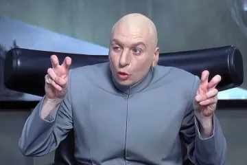 Dr. Evil, from the Austin Powers series (bald man in a grey suit) making air quotes with both hands.