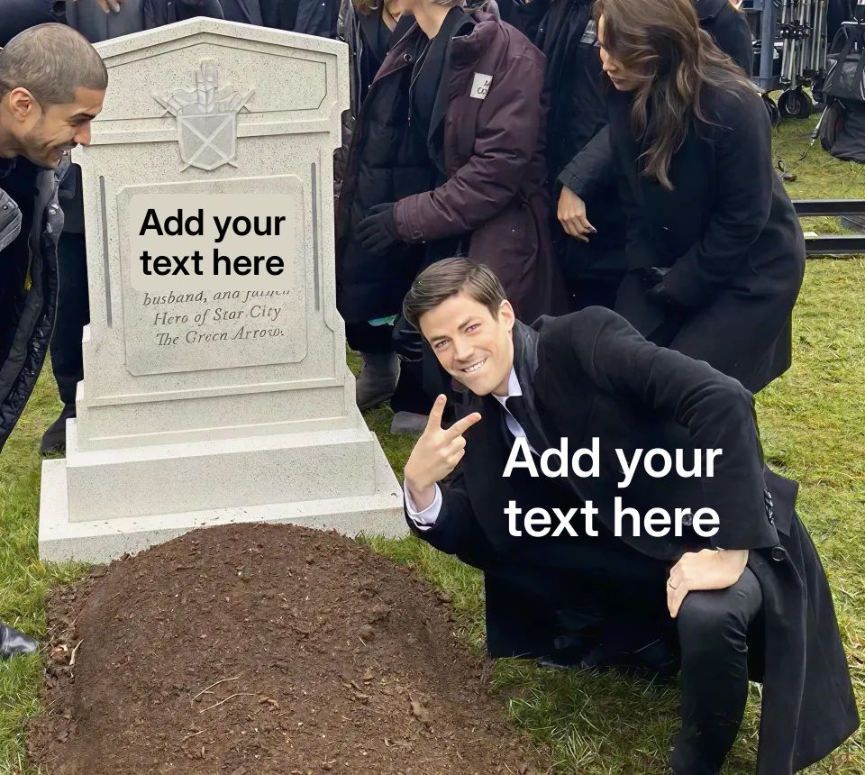 Man in a suit crouching and posing with a peace sign next to a grave.