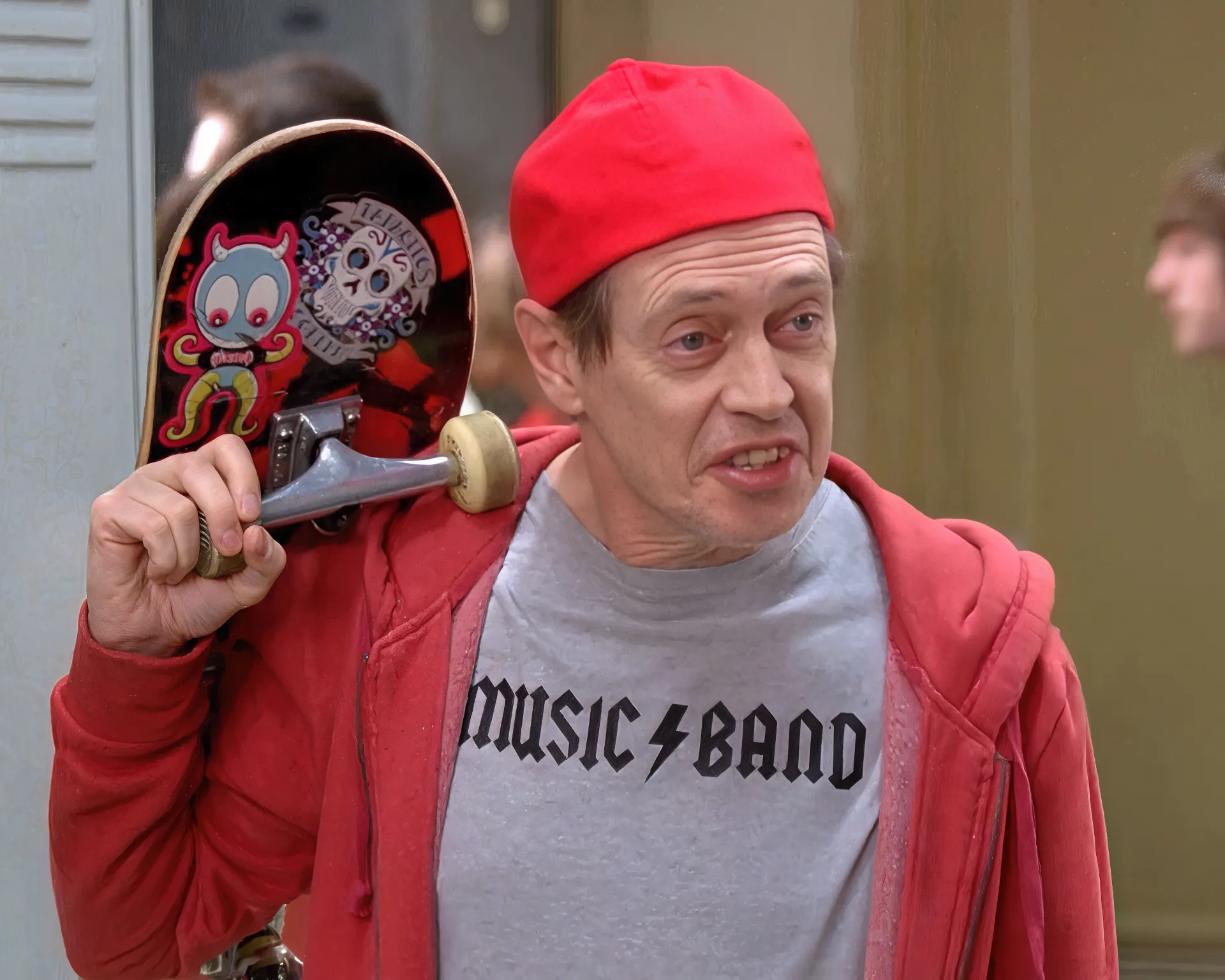 A man in a red cap and hoodie holding a skateboard, saying 'How do you do, fellow kids?'