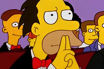 Lenny from The Simpsons thinking with hands clasped under chin.