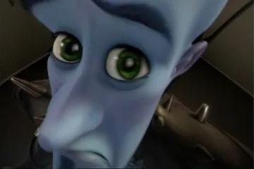 Megamind with a curious expression peeking from a corner.