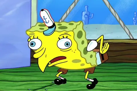 Spongebob Squarepants in a mocking pose with distorted features.