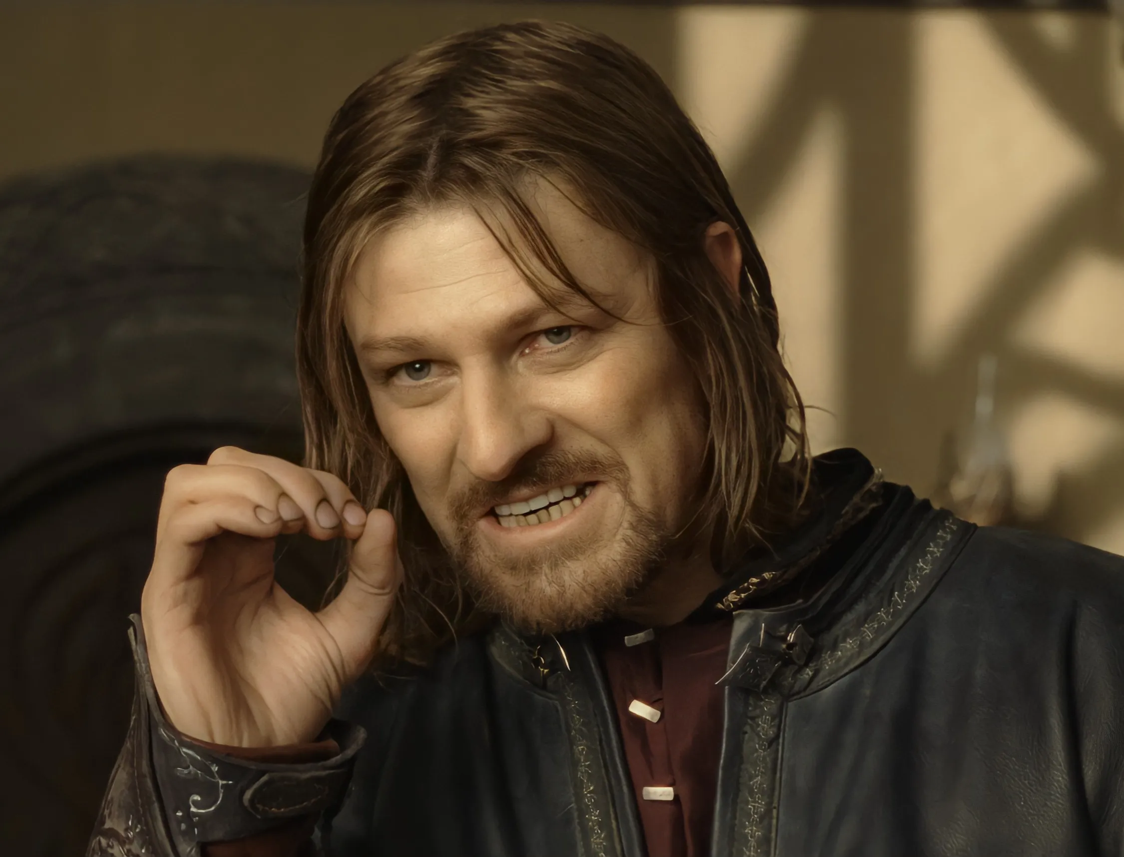 Boromir from Lord of the Rings making a gesture with his hand.