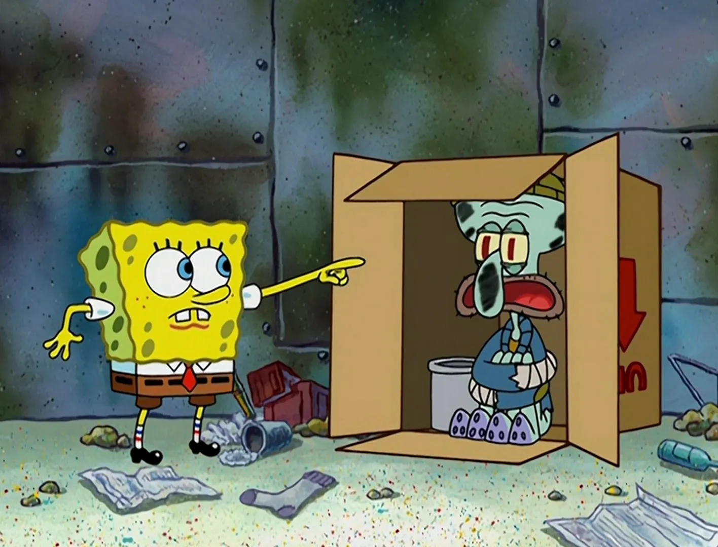 SpongeBob pointing at Squidward sitting in a cardboard box.