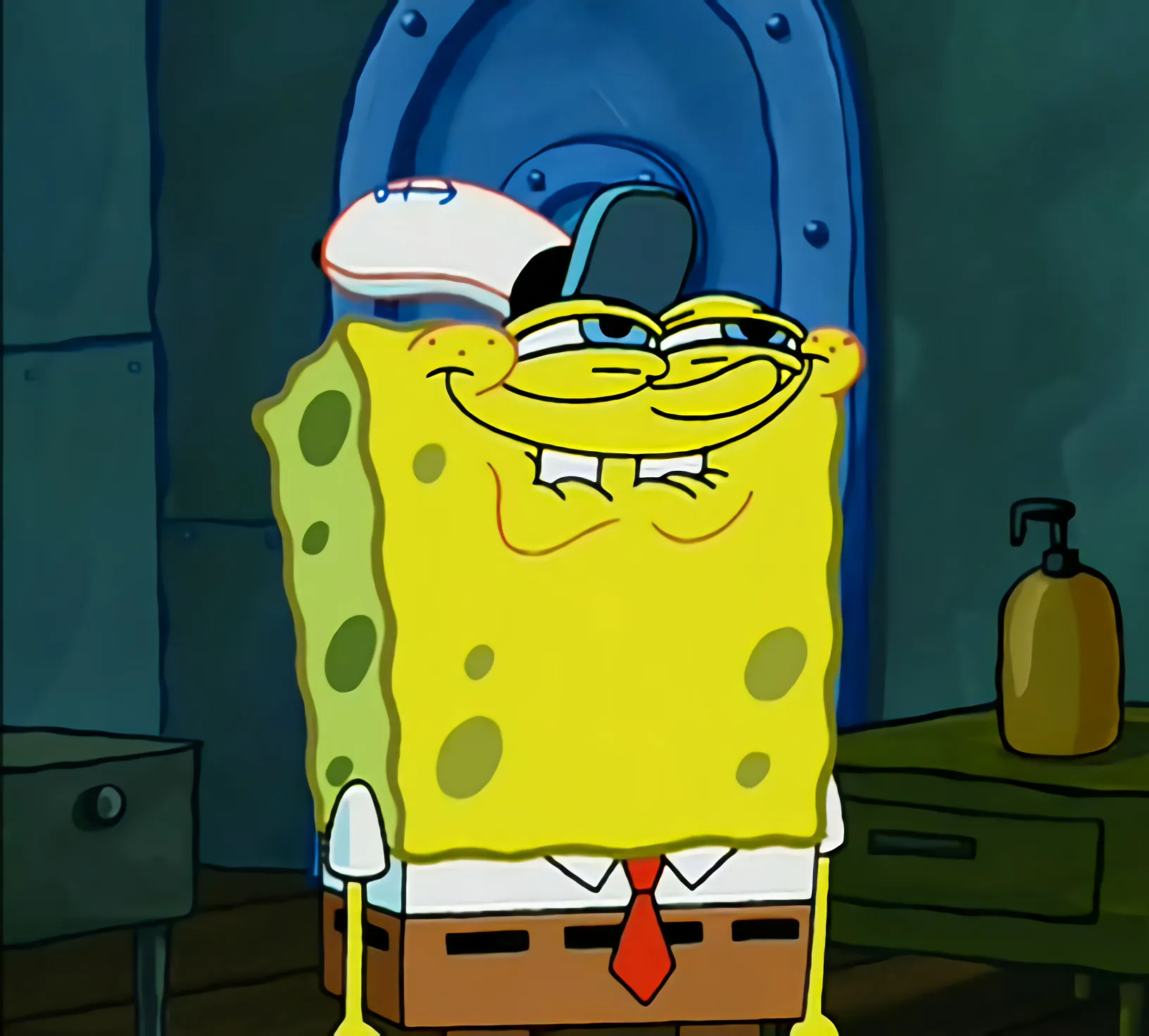 Spongebob Squarepants smirking with a mischievous expression in a Krusty Krab kitchen.