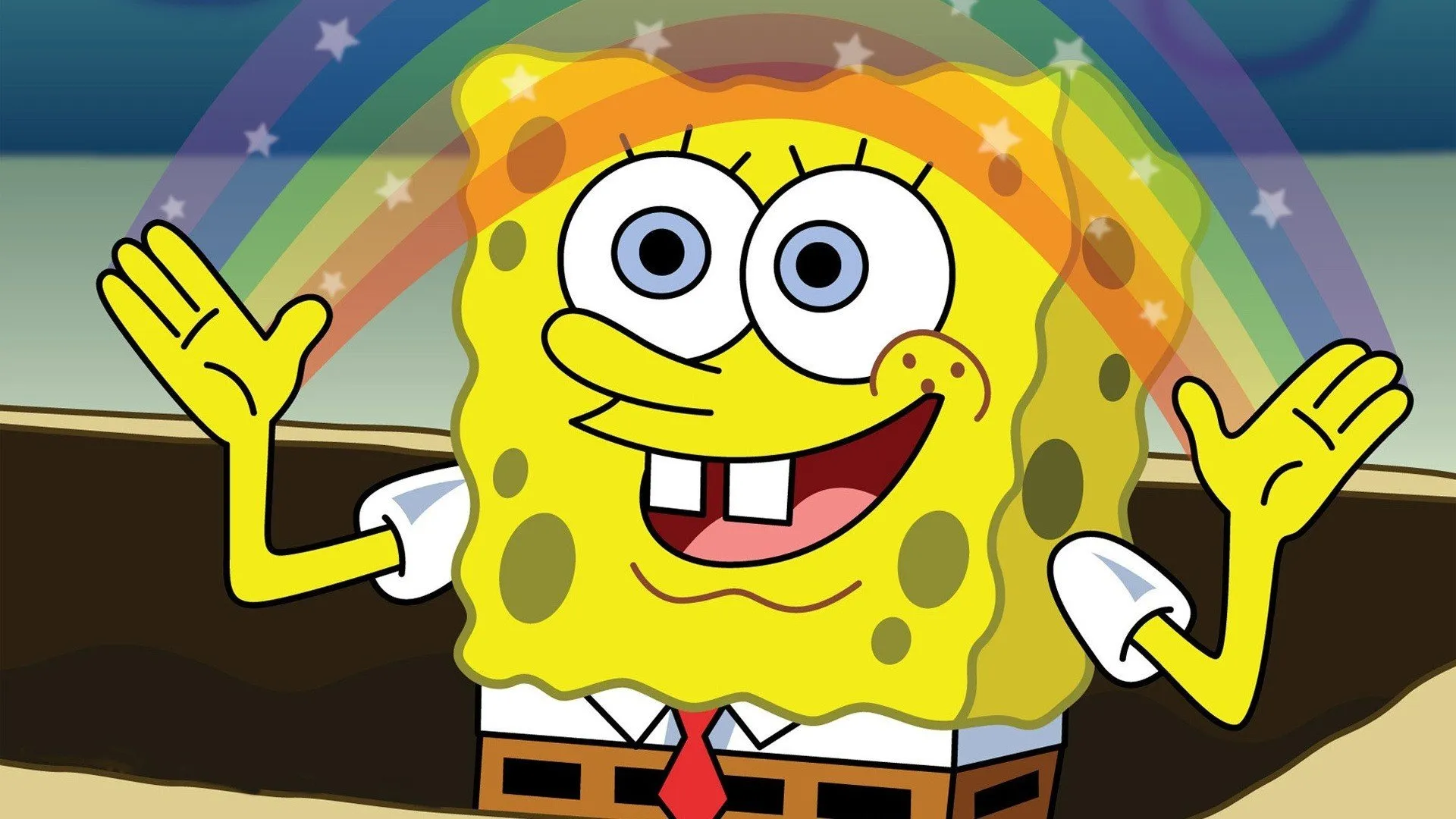 Spongebob Squarepants with a rainbow above his hands, smiling.