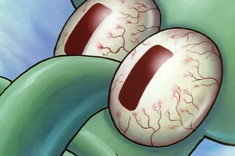 Close-up of Squidward's eyes from SpongeBob SquarePants, wide open and bloodshot.