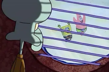 Squidward looking out a window at SpongeBob and Patrick playing outside.
