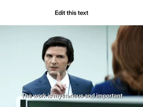 Man in a suit gesturing with finger, talking to a woman in an office setting.