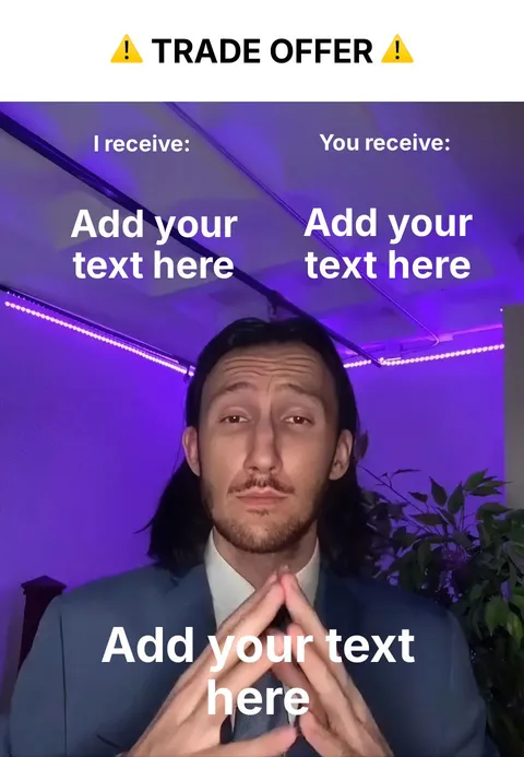 Person in a suit with hands clasped, purple lighting in the background.